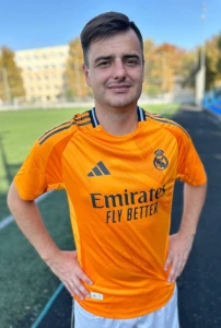 Футболка Реал Мадрид (Real Madrid) 2024-2025 виїзна помаранчево-чорна F0058