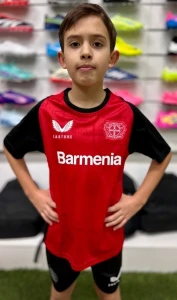 Футбольна форма дитяча Байєр (Bayer Leverkusen) 2024-2025 домашня червоно-чорна F0100