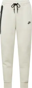 Спортивні штани підліткові Nike TECH FLEECE бежеві FD3287-020