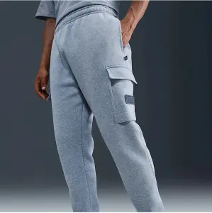 Спортивні штани Nike PARIS SAINT-GERMAIN CLUB FOOTBALL CARGO блакитні HM2945-493