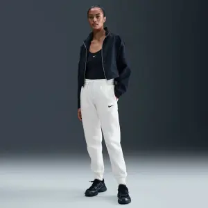 Спортивні штани жіночі Nike PHOENIX FLEECE MID-RISE PANTS кремові FZ7626-133