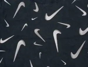 Футболка спортивна підліткова Nike чорно-біла DO4639-010
