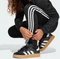 Спортивный костюм детский Adidas TIRO 25 ESSENTIALS TRACKSUIT черно-белый JD0625