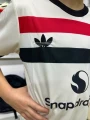 Футбольна форма дитяча Манчестер Юнайтед (Manchester United) 2024-2025 резервна біло-чорно-червона F0025