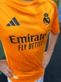 Футболка Реал Мадрид (Real Madrid) 2024-2025 виїзна помаранчево-чорна F0058
