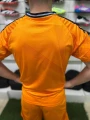 Футбольна форма Реал Мадрид (Real Madrid) 2024-2025 виїзна помаранчево-чорна F0085