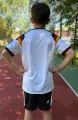 Футбольная форма детская сборной Германии 2026 Чемпионат Мира домашняя бело-черно-красно-желтая F0539