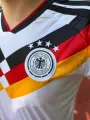 Футбольная форма сборной Германии 2026 Чемпионат Мира домашняя бело-черно-красно-желтая F0583