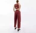 Спортивные штаны женские New Balance ATHLETICS REMASTERED TEXTURED бордовые WP31502WAD