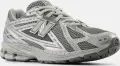 Кроссовки New Balance 1906R серо-серебряные M1906REH