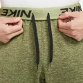 Спортивні штани Nike M NK TF PANT TAPER зелені DQ5405-326