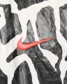Вітровка Nike M NSW TREND JKT AOP чорно-біла DX0035-060