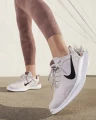 Кроссовки беговые женские Nike W FLEX EXPERIENCE RN 12 бежево-коричневые DV0746-001