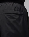 Спортивные штаны Nike JORDAN ESSENTIALS WOVEN PANTS черные FV7306-010