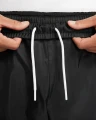 Спортивні штани Nike WINDRUNNER WOVEN LINED PANTS чорні DX0653-011