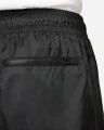 Спортивні штани Nike WINDRUNNER WOVEN LINED PANTS чорні DX0653-011