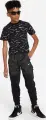 Футболка подростковая Nike SWOOSH ALL-OVER-PRINT черная FN9605-010