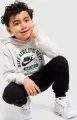 Спортивный костюм детский Nike SPORTSWEAR P.E. FT кремово-черный 86N227-023