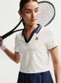 Поло для тенісу жіноче Nike NIKECOURT COLLECTION DRI-FIT CROPPED кремово-темно-синє IB0772-133
