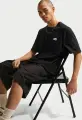 Футболка Nike SPORTSWEAR VOMERO PATCH чорна IH1149-010