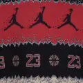 Спортивний костюм дитячий Nike JORDAN MJ HOLIDAY чорно-червоно-бежевий 85C785-023