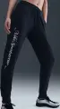 Спортивные штаны женские Nike SPORTSWEAR CLUB FLEECE MID-RISE GRAPHIC черные HV2346-010