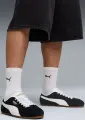 Кросівки Puma TACKLE чорно-білі 40445601