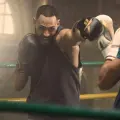 Рукавички боксерські Reebok BOXING GLOVES чорно-золоті (14 унцій) RSCB-11117GB-14