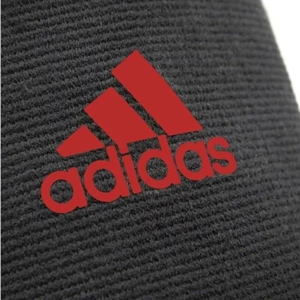 Фіксатор коліна Adidas PERFORMANCE KNEE SUPPORT чорно-червоний S ADSU-13321RD