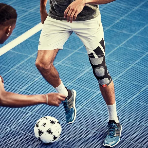Фиксатор колена Adidas KNEE SUPPORT черно-серый S ADSU-12521BK-NL
