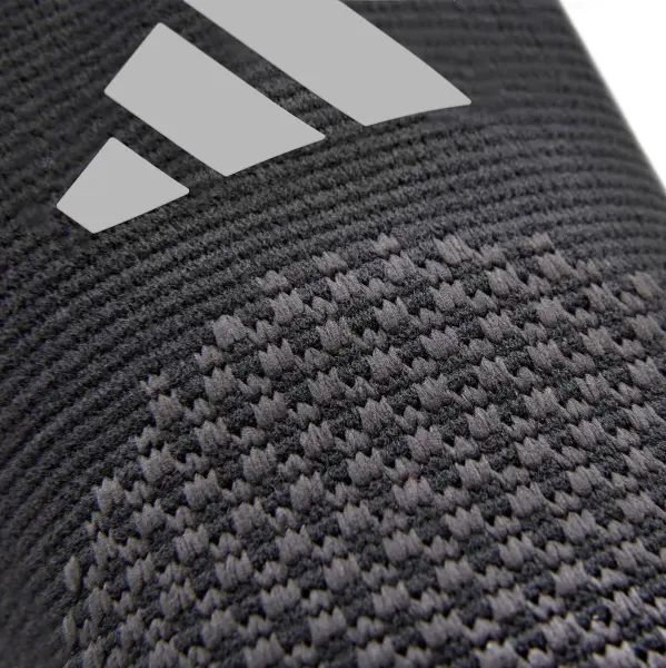 Фиксатор локтя Adidas PERFORMANCE ELBOW SUPPORT черный L ADSU-13333-NL