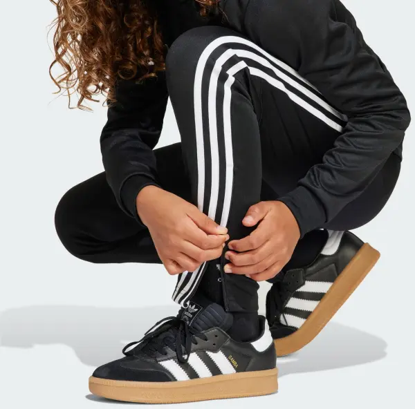 Спортивный костюм детский Adidas TIRO 25 ESSENTIALS TRACKSUIT черно-белый JD0625