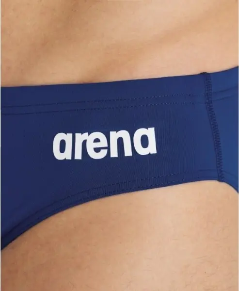 Плавки-брифи Arena TEAM SWIM BRIEFS SOLID темно-синьо-білі 004773-750