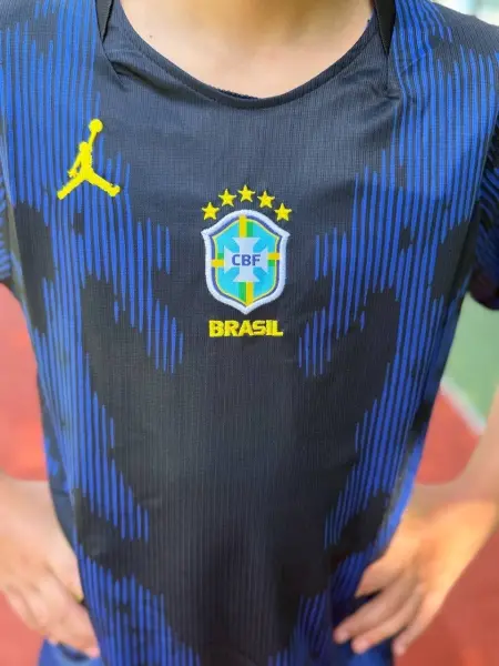Футбольна форма дитяча збірної Бразилії 2026 Чемпіонат світу виїзна темно-синьо-жовто-м'ятна F0535