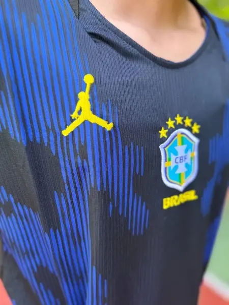 Футбольна форма дитяча збірної Бразилії 2026 Чемпіонат світу виїзна темно-синьо-жовто-м'ятна F0535
