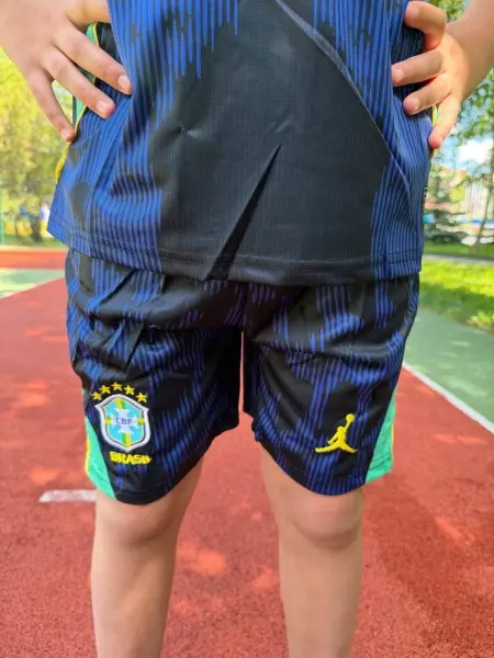 Футбольна форма дитяча збірної Бразилії 2026 Чемпіонат світу виїзна темно-синьо-жовто-м'ятна F0535