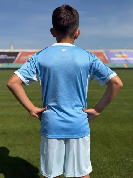 Футбольна форма дитяча Манчестер Сіті (Manchester City) 2026-2027 домашня блакитно-біла F0679