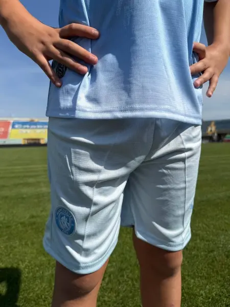 Футбольна форма дитяча Манчестер Сіті (Manchester City) 2026-2027 домашня блакитно-біла F0679