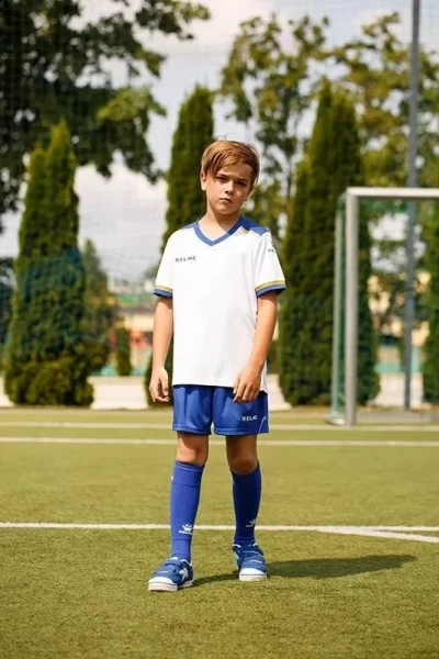 Комплект футбольної форми дитячий Kelme SEGOVIA біло-синьо-жовтий 8351ZB3158.9104