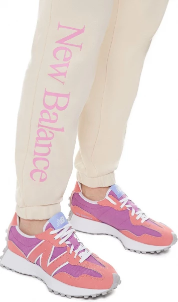 Спортивные штаны женские New Balance Essentials Celebrate бежевые WP21508CTU