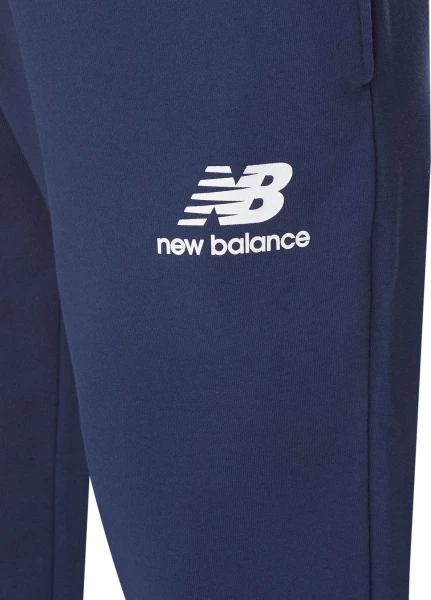 Спортивные штаны New Balance ESSENTIALS STACKED LOGO синие MP31539NNY