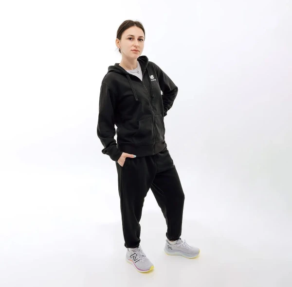 Спортивні штани жіночі New Balance ESSENTIALS REIMAGINED ARCHIVE чорні WP31508BK