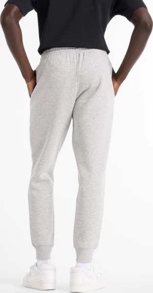 Спортивні штани New Balance SPORT FLEECE світло-сірі MP43904AG