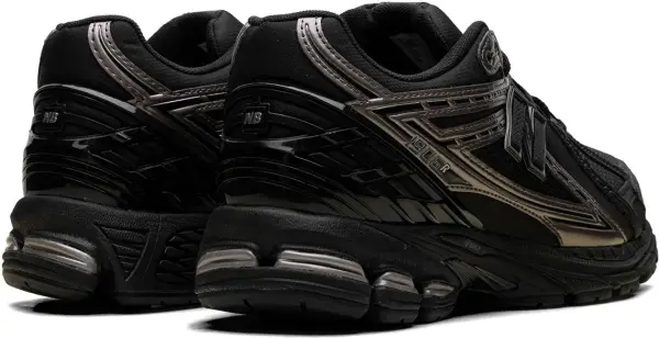 Кросівки New Balance 1906R чорно-золоті U1906RJM