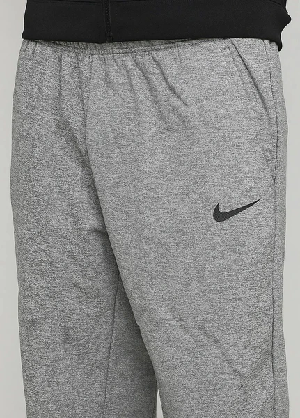Спортивные штаны Nike THERMA PANT TAPER серые 932255-063