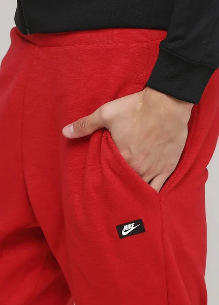 Штаны спортивные Nike SPORTSWEAR OPTIC JOGGER красные 928493-687