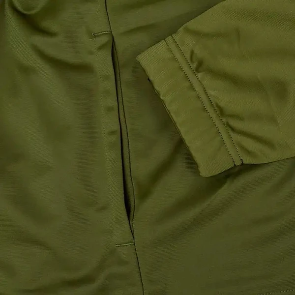 Спортивный костюм Nike SPE TRK SUIT PK BASIC зеленый BV3034-326