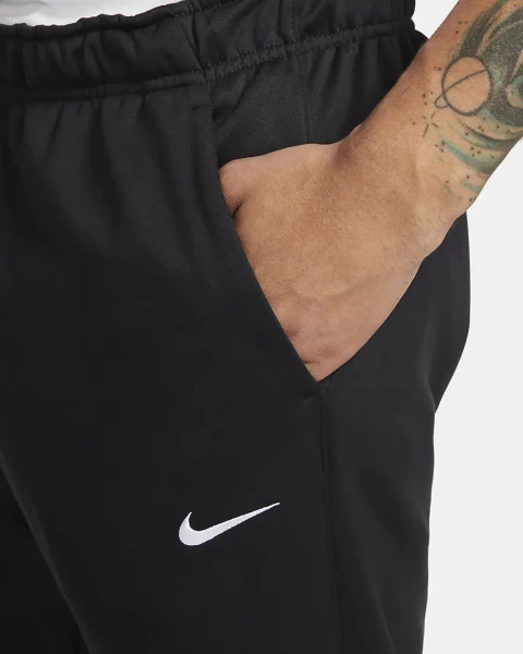Спортивные штаны Nike M NK TF PANT TAPER черные DQ5405-010