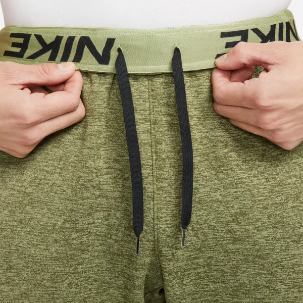Спортивні штани Nike M NK TF PANT TAPER зелені DQ5405-326