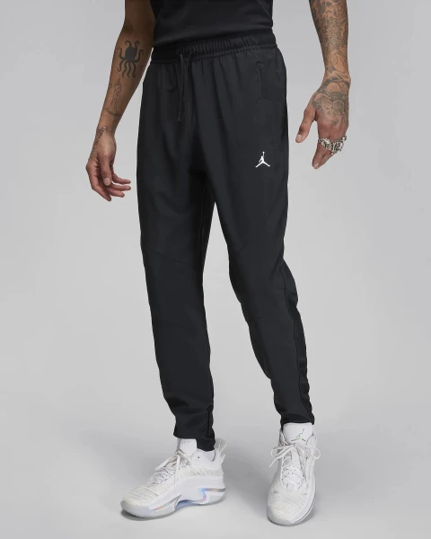 Спортивные штаны Nike M J DF SPRT WOVEN PANT черные FN5840-010